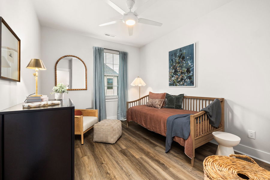 Secondary bedroom with natural light at HARMON Jefferson Village