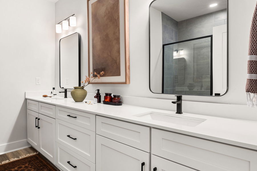 Double vanity in a primary bathroom at HARMON Jefferson Village