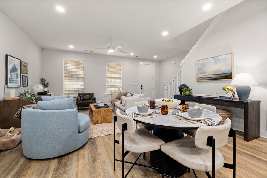 Open-concept living and dining area in a HARMON Jefferson Village townhome